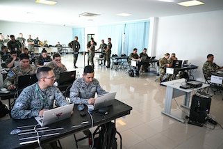 Multiple nations participate in CRUZEX CYBER at Natal Air Force Base, Brazil, Nov. 8, 2024. This year during CRUZEX, the addition of cyber scenarios aims to expand the scope of the exercise by highlighting the crucial intersection of cyber and aerospace domains. (U.S. Air Force photo by Staff Sgt. Madeline Herzog)