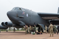 Airmen gather around a B-52H Stratofortress