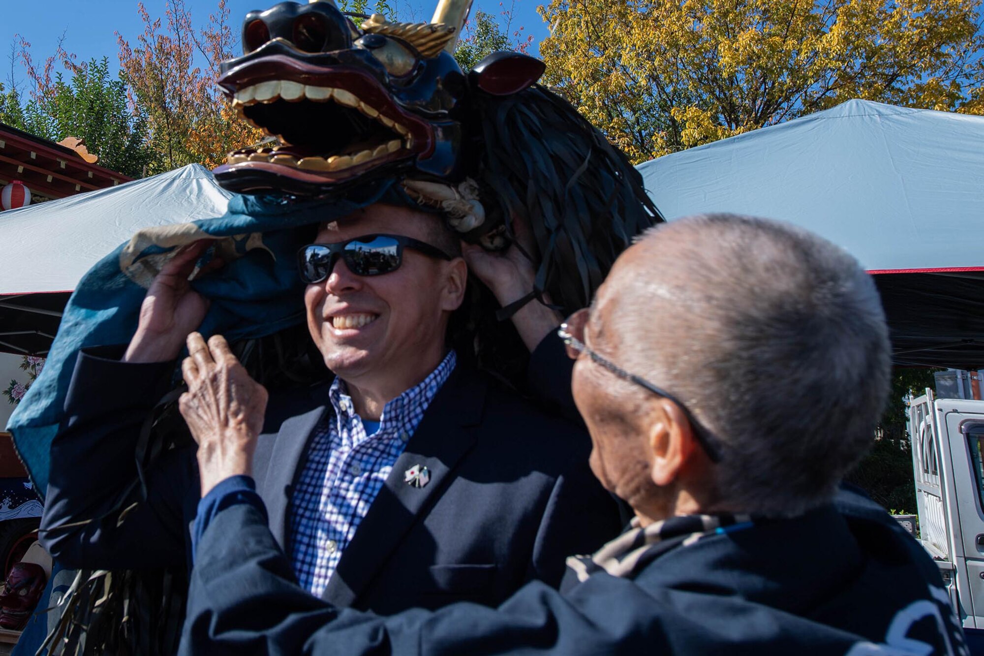 An Airman puts on a mask.