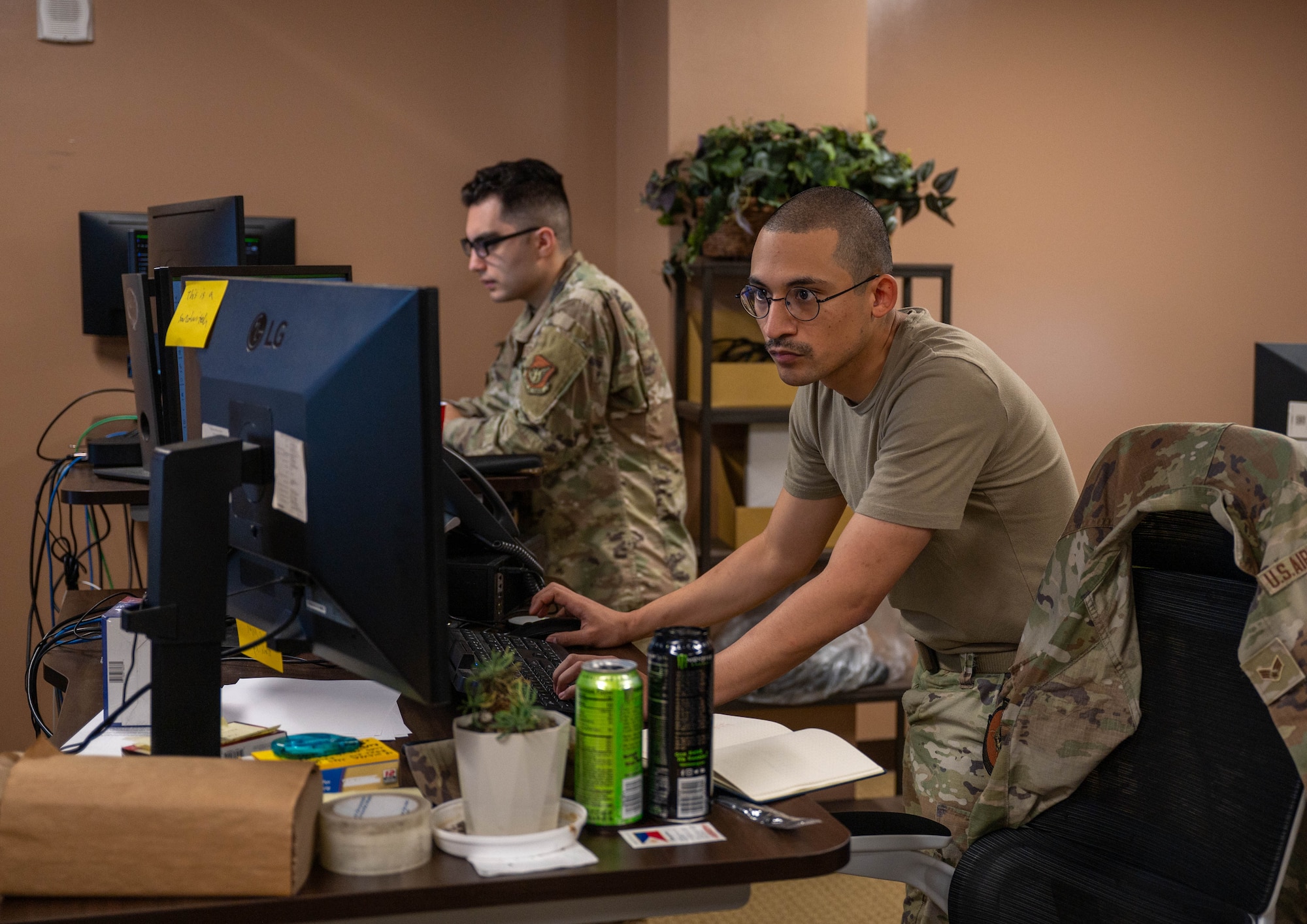 military service member works on computer