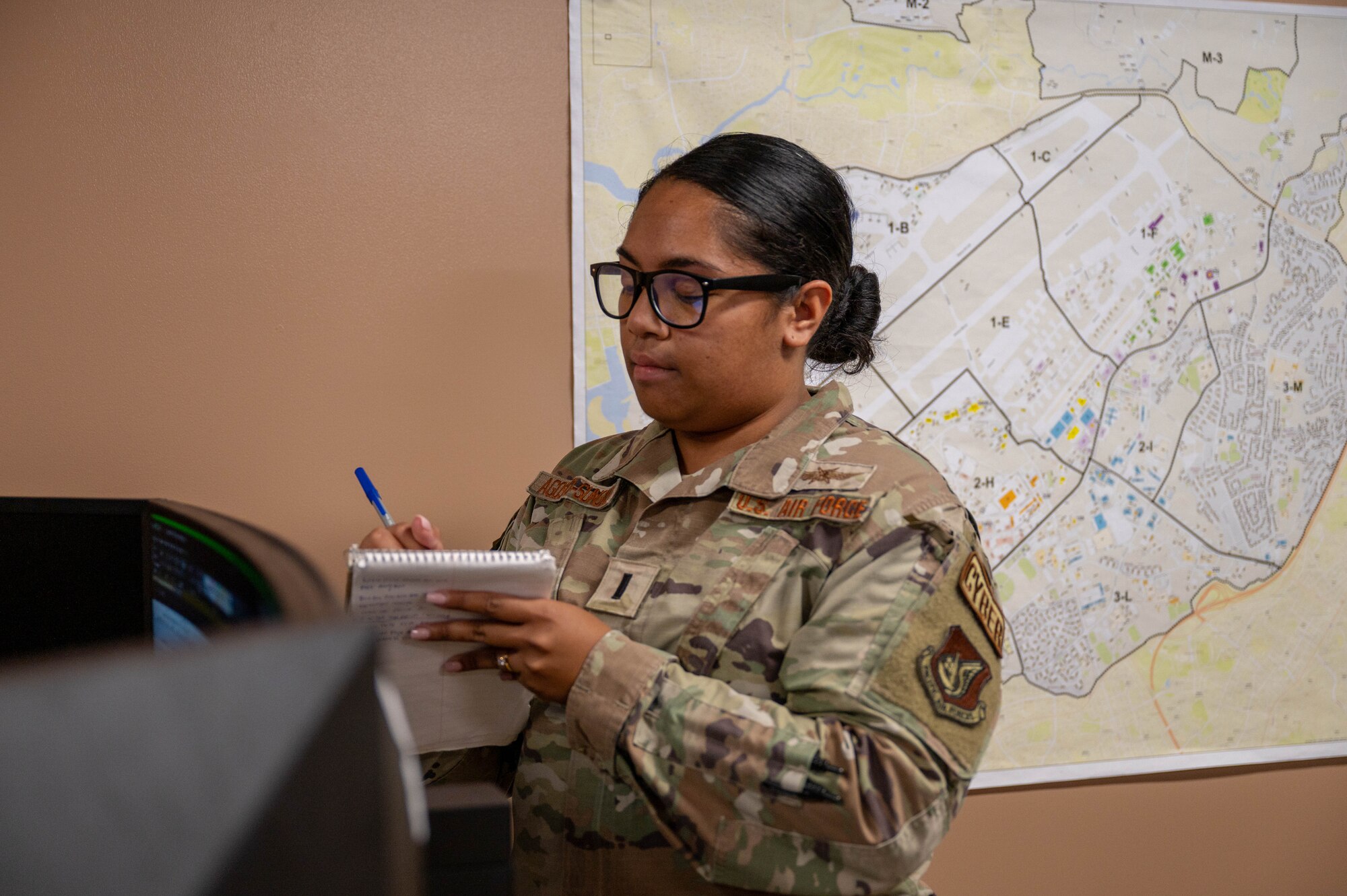military service member takes notes