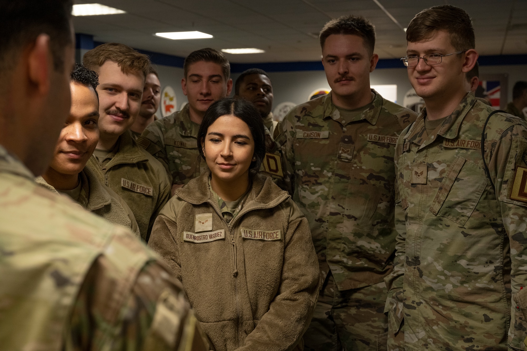 U.S. Air Force Airmen assigned to the 100th Air Refueling Wing discuss plans for their upcoming deployment at Royal Air Force Mildenhall, England, Nov. 6, 2024.