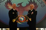 Vice Adm. Jeffrey Anderson, commander, U.S. 6th Fleet, (left) and Commodore Noureddine Chakroun, Deputy Chief of Staff of the Tunisian Navy,  exchange gifts during the closing ceremony for Phoenix Express 2024 in Tunis, Tunisia, Nov. 15, 2024.