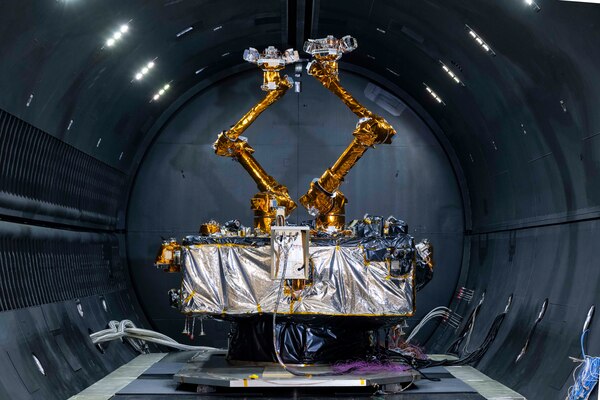 A robot is inside an enclosed cylindrical chamber.
