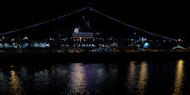 The USS Midway Museum illuminates during the kick-off of Fleet Week San Diego, Nov. 7, 2024. FWSD is an opportunity for San Diego residents and tourists to meet their Navy, Marine Corps and Coast Guard teams and experience America’s sea services. During fleet week, service members participate in various community relations events, showcase capabilities and equipment to the community, and enjoy the hospitality of San Diego and the surrounding area. (U.S. Marine Corps photo by Sgt. Brian A. Stippey)