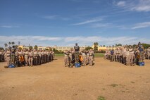 U.S. Marine Corps recruits with Lima Company, 3rd Recruit Training Battalion, hydrate prior to the introduction of the combat fitness test at Marine Corps Recruit Depot San Diego, California, Oct 30, 2024. The recruits were introduced to the CFT by conducting different portions of the test separately. The CFT is an annual fitness test that is required of all Marines to pass and maintain consisting of an 880-yard sprint, ammunition can lifts, and a maneuver under fire drill. (U.S. Marine Corps photo by Lance Cpl. Janell B. Alvarez)