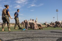 U.S. Marine Corps recruits with Lima Company, 3rd Recruit Training Battalion, execute a high crawl during the maneuver under fire portion of the combat fitness test event at Marine Corps Recruit Depot San Diego, California, Oct. 30, 2024. The CFT is a test that all recruits must pass and maintain once a year to assess combat readiness as well as physical conditioning. (U.S. Marine Corps photo by Lance Cpl. Janell B. Alvarez)