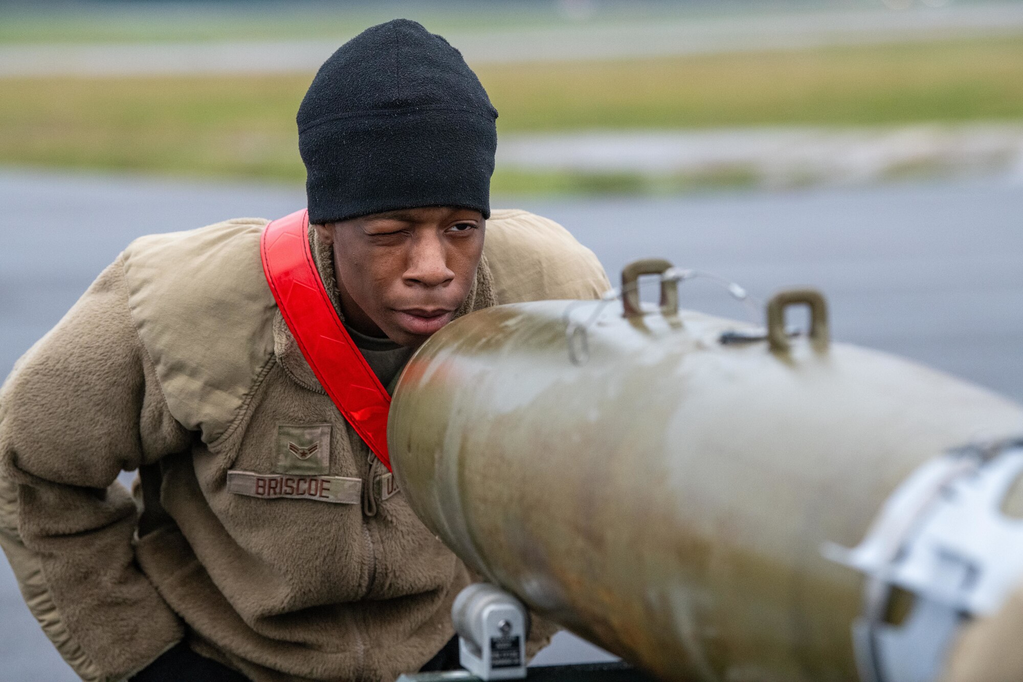 Airman inspects GBU-38 Joint Direct Attack Munitions