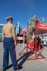 A recruiter with Recruiting Sub-Station El Cajon, Recruiting Station San Diego, monitors a U.S. Navy Sailor as he conducts pull-ups during Fleet Week San Diego at Broadway Pier, San Diego, Nov. 9, 2024. FWSD is an opportunity for San Diego residents and tourists to meet their Navy, Marine Corps and Coast Guard teams and experience America’s sea services. During fleet week, service members participate in various community relations events, showcase capabilities and equipment to the community, and enjoy the hospitality of San Diego and the surrounding area. (U.S. Marine Corps photo by Sgt. Gabriel Tavarez)