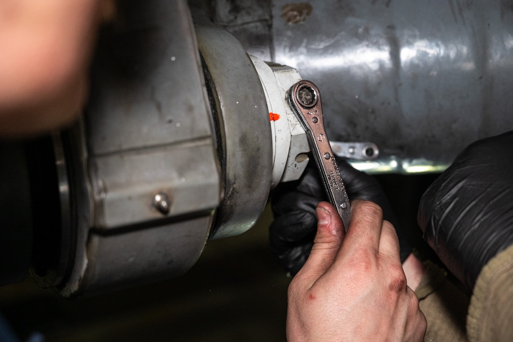 A maintenance Airman removes a C-17 Globemaster III part at Joint Base Lewis-McChord, Washington, Nov. 13, 2024.