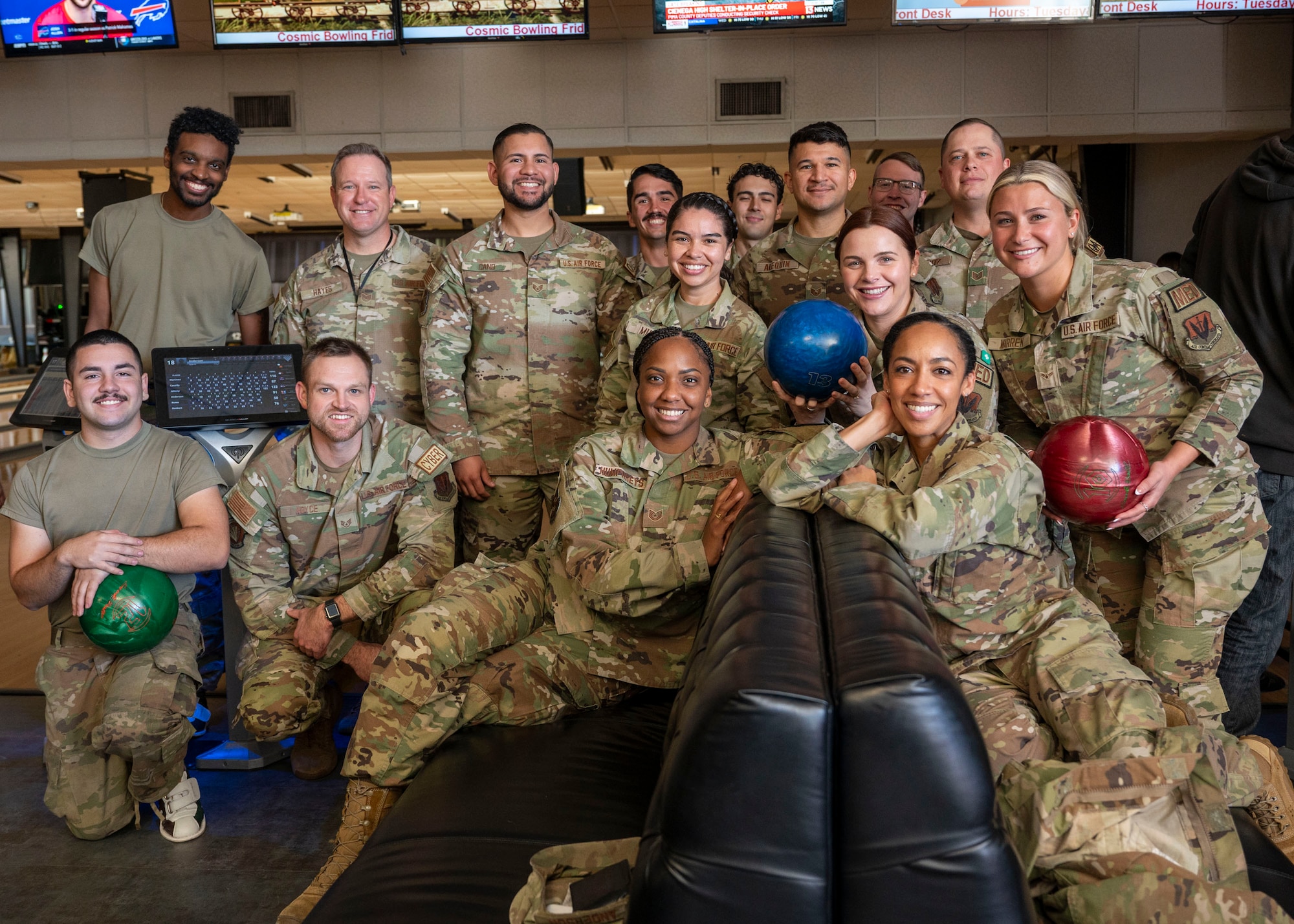 U.S. Airmen from the Desert Lightning Team 5/6 and Airmen Committed to Excellence pose for a group photo during Airman’s Week bowling day at Davis-Monthan Air Force Base, Arizona, Nov. 13, 2024. The DLT 5/6 organized Airman’s Week with sponsorship from the Chiefs Group and First Sergeants Council on base. (U.S. Air Force photo by Senior Airman William Finn V)