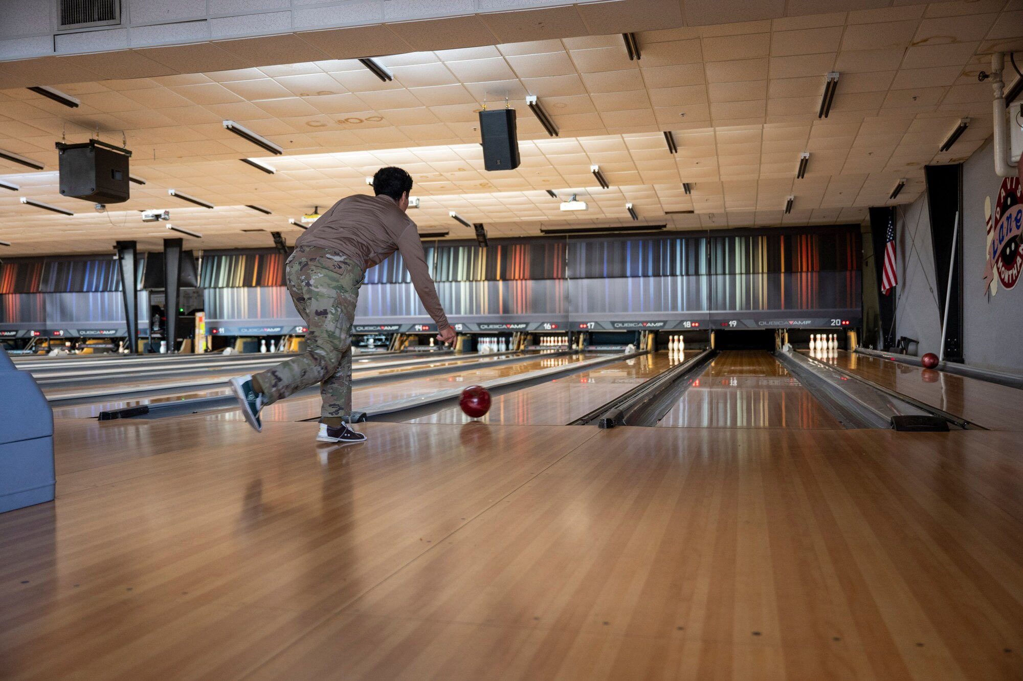 A U.S. Airman bowls during Airman’s Week at Davis-Monthan Air Force Base, Arizona, Nov. 13, 2024. The Desert Lightning team 5/6 organized the bowling event and Airman’s Week to promote morale building and strengthen networking among Airmen. (U.S. Air Force photo by Senior Airman William Finn V)