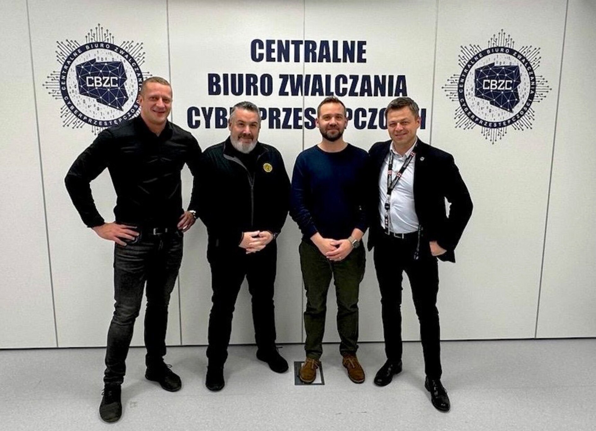 Army CID and Polish State Cyber Police stand together for a group photo