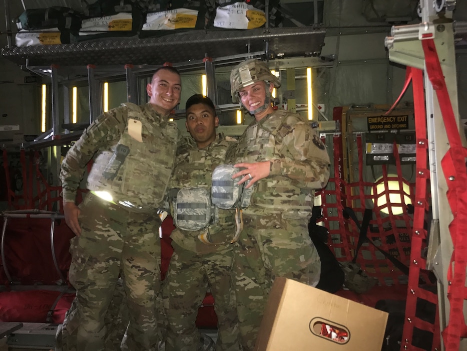 U.S. Air Force Tech. Sgt. Jordan Dodd, 97th Training Squadron master military training leader, right, poses for a photo with friends in a C-130 aircraft in Kuwait in 2017. Dodd received an Air Force Commendation Medal with a combat device for her service during her first deployment. (courtesy photo)