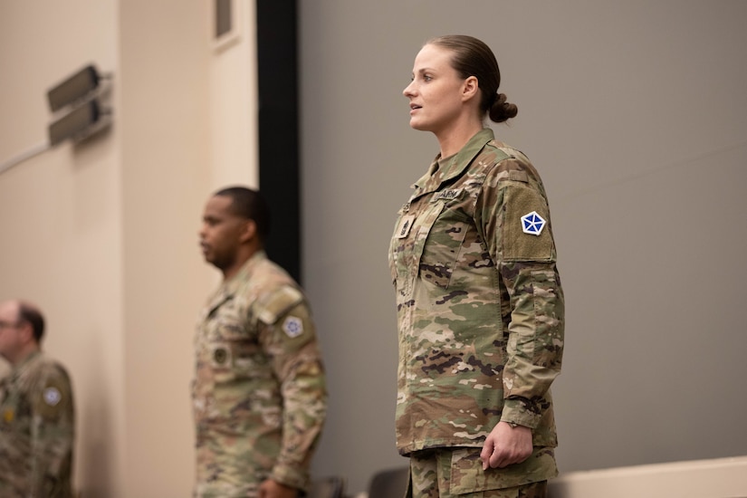 U.S. Army 1st Sgt. Tammy Aherns, Signal Intelligence and Sustainment Company incoming first sergeant, sings the Victory Song during a change of responsibility ceremony Nov. 7, 2024. The ceremony is a time-honored military tradition that serves as an important moment to acknowledge the hard work and sacrifices of both the outgoing and incoming leaders.