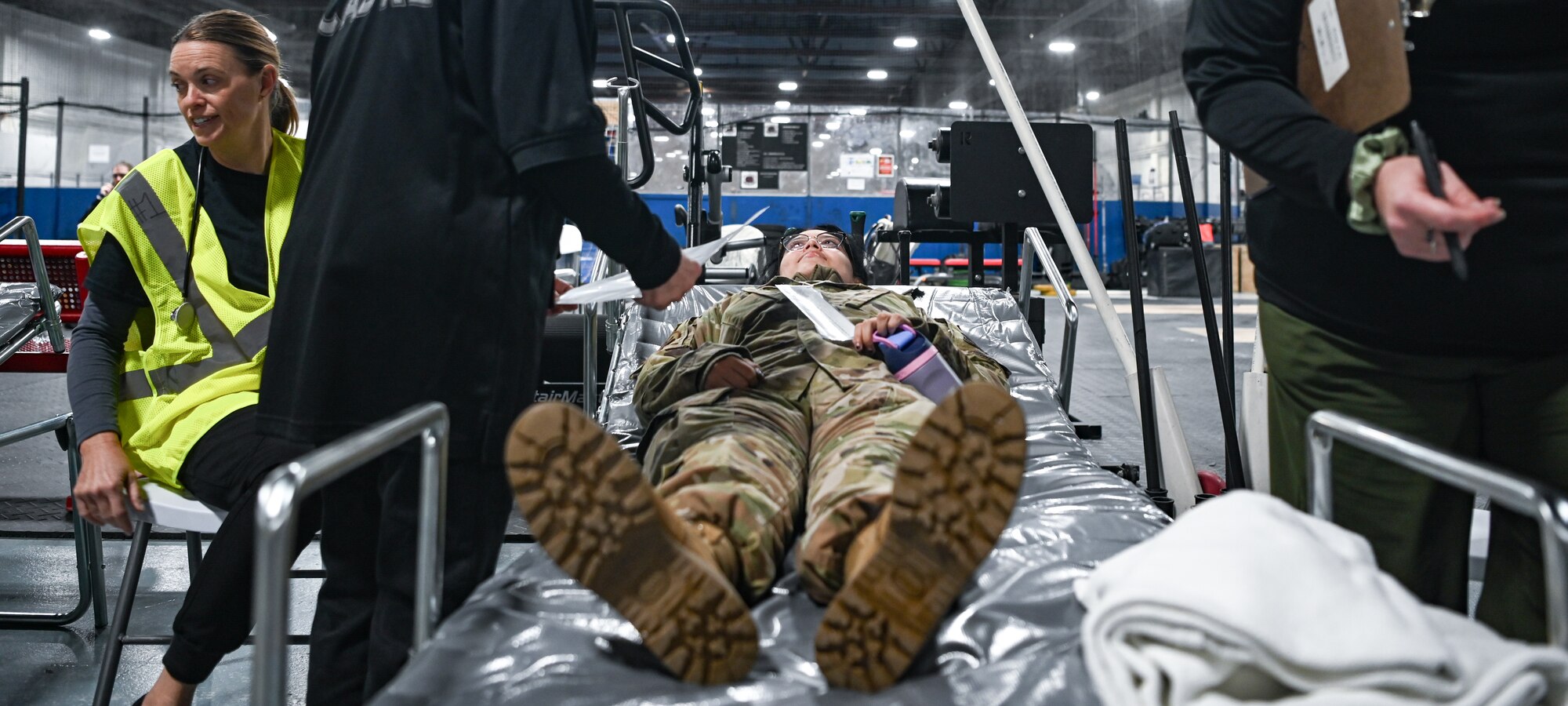 Person lays on stretcher