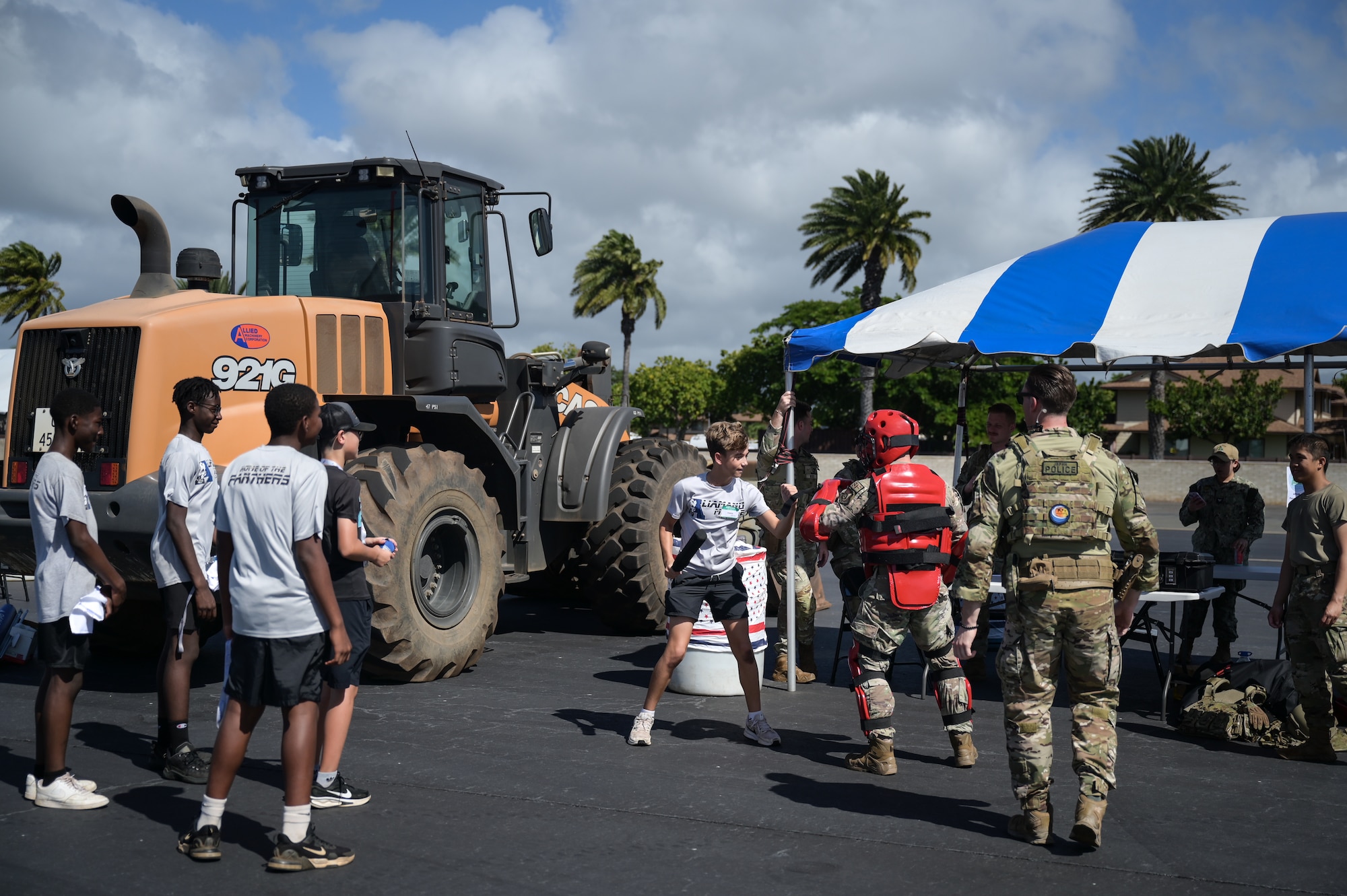 Airmen showcase combatants to students.