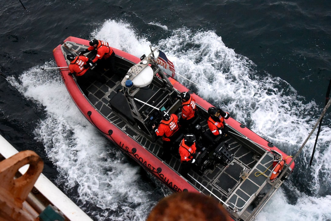 Coast Guard Cutter Stratton (WMSL 752) crew members conduct small boat operations near Unimak Island, Alaska, Sept. 10, 2024. Stratton conducted 20 boardings of commercial fishing vessels and foreign trans-shipment vessels enforcing safety and fishing regulations during the cutter’s 110-day patrol of the region. U.S. Coast Guard courtesy photo.