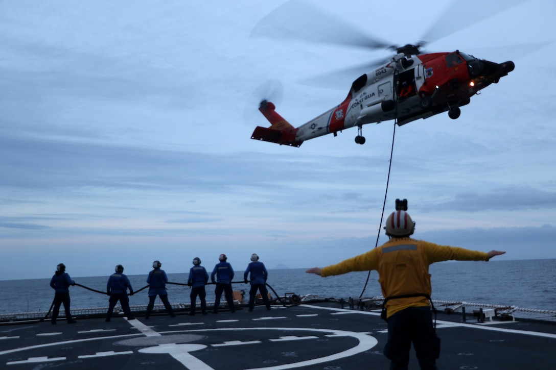 The Coast Guard Cutter Stratton (WMSL 752) conducts a helicopter in-flight refueling (HIFR) evolution South of Unimak Island, Alaska, with an Air Station Kodiak MH-60 aircrew forward deployed to Cold Bay, Alaska, Oct. 25, 2024. Stratton recently returned to its homeport of Alameda, California, following a 110-day deployment to the region. U.S. Coast Guard courtesy photo.