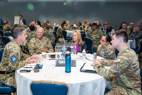 USSF Lt. Gen. Philip Garrant, SSC commander, Ms. Joy White, executive director of SSC, and Chief Master Sgt. Jacqueline Sauvé, SSC senior enlisted leader (second, third, and fourth from left, respectively) encouraging connectivity across Space Systems Command’s senior leadership team during the “SSC Perigee Commander’s Conference” Nov. 13-14, 2024, at SSC headquarters at Los Angeles Air Force Base.