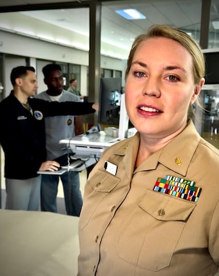 SAN DIEGO (Nov. 15, 2024) Naval Medical Center San Diego proudly received an “A” Leapfrog Hospital Safety Grade for Fall 2024, demonstrating NMCSD’s continued commitment to safe, high-quality care and transparency, Nov. 15, 2024.  Lt. Cmdr. Katelin Clardy, Department Head for NMCSD's Office of Clinical Quality, gathers for an environmental photo.  Clardy and her team are integral in ensuring that the command upholds the basic tenant of complying with an enterprise program such as Leapfrog.  The Leapfrog Hospital Safety Grade is a letter grade program that rates a hospital’s patient safety measures through more than 30 national performance indicators. Each indicator reflects errors, accidents, injuries, and infections, as well as the systems hospitals have in place to prevent patient harm. This enables all hospitals, including military, to publicly report their progress in quality and safety.  The mission of NMCSD is to prepare service members to deploy in support of operational forces, deliver high-quality health care services, and shape the future of military medicine through education, training, and research.  NMCSD employs more than 5,000 active-duty military personnel, civilians, and contractors in southern California to provide patients with world-class care. Anchored in Excellence, Committed to Health!