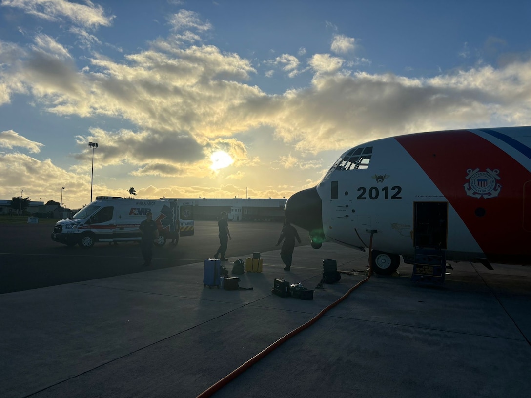 A U.S. Coast Guard Air Station Barbers Point HC-130 Hercules airplane crew conducts post-flight checks on the ramp at Air Station Barbers Point after launching for a medivac on Midway Atoll, Nov. 17, 2024. The U.S. Coast Guard responded to a medivac request for a man experiencing symptoms of a stroke or seizure on Midway Atoll. (U.S. Coast Guard photo by Cmdr. Victor Yaguchi)