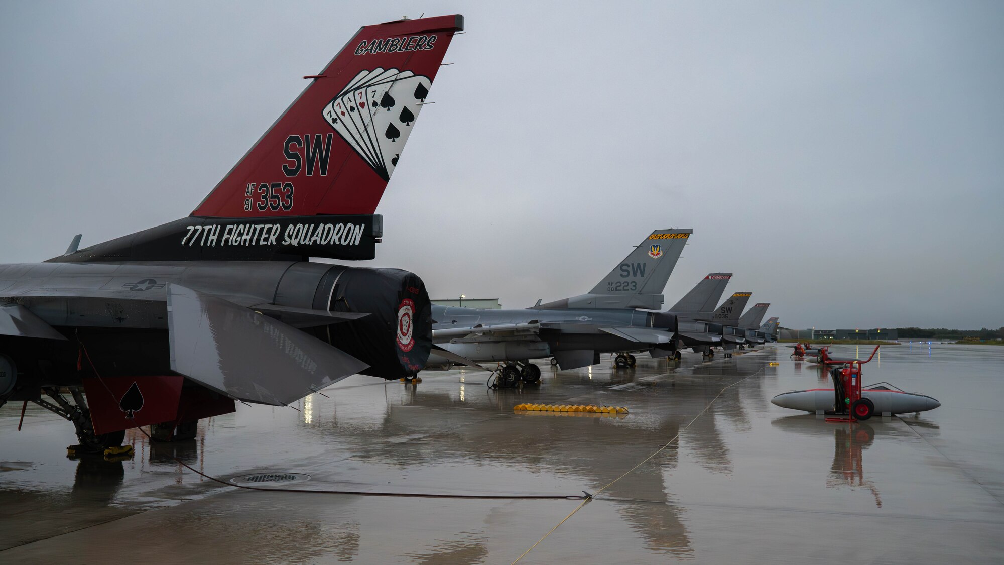 U.S. Air Force F-16 Fighting Falcons, assigned to the 77th Expeditionary Fighter Squadron, sit on the flight line during Keen Sword 25 at Japan Air Self-Defense Force Tsuiki Air Base, Japan, Oct. 28, 2024.