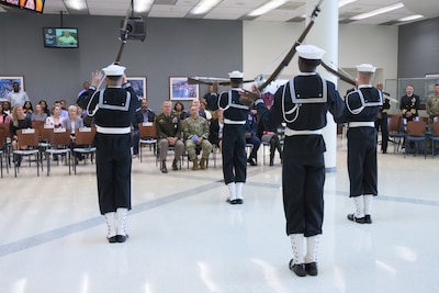United States Navy Drill Team preforms during the Defense Logistics Agency Energy 249th Navy birthday celebration.