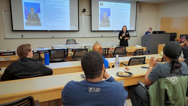 Capt. Alison Castro, deputy corps chief of the Navy Nurse Corps, shares her experience serving as a nurse in the U.S. Navy with Kansas City area college students during Navy Week in Kansas City, Nov. 11, 2024. Navy Weeks are part of outreach efforts intended to educate the American public on the Navy’s capabilities and relevance to national security. (U.S. Navy photo by Malcolm McClendon)