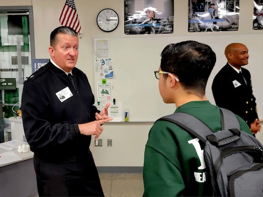 Rear Adm. Walter Brafford, commander of the Naval Medical Forces Development Command and chief of the Navy Dental Corps shares his experience serving as a dentist in the U.S. Navy with Kansas City area high school students during Navy Week in Kansas City, Nov. 13, 2024. Navy Weeks are part of outreach efforts intended to educate the American public on the Navy’s capabilities and relevance to national security. (U.S. Navy photo by Malcolm McClendon)