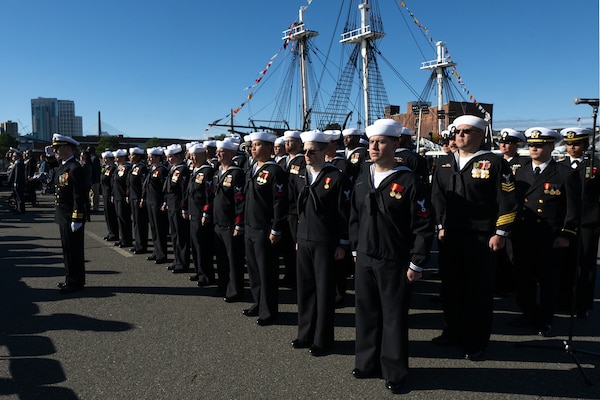 The crew of USS Nantucket (LCS 27) stands in formation for the ship’s commissioning ceremony in Boston.