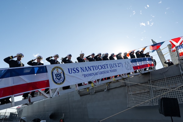 The crew of the newest Freedom-variant littoral combat ship USS Nantucket (LCS 27) brings the ship to life during the commissioning ceremony for USS Nantucket in Boston.