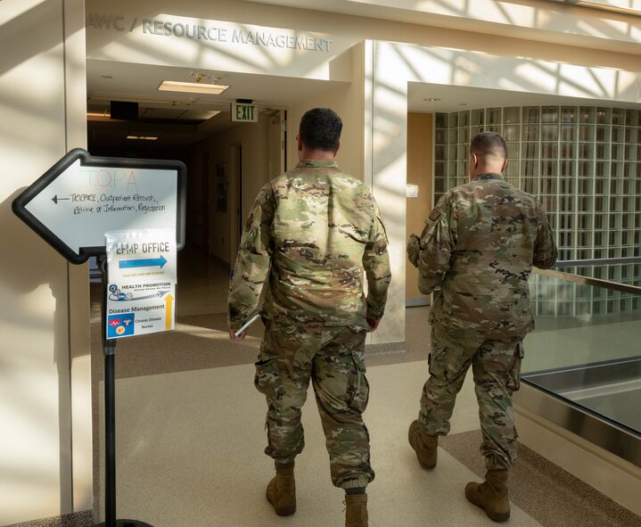 U.S. Air Force Col. Shaun Westphal, 5th Medical Group commander, shows Air Force Brigadier Gen. Mark Richey, mobilization assistant to the commander, Eighth Air Force, and Joint-Global Strike Operations Center, around the 5MDG building as part of his visit to Minot Air Force Base, North Dakota, Nov. 14, 2024. The Eighth Air Force encompasses approximately 24,000 Airmen across six installations, and operates more than 150 E-4, B-1, B-2, and B-52 aircraft. (U.S. Air Force photo by Airman 1st Class Wesley Davies)