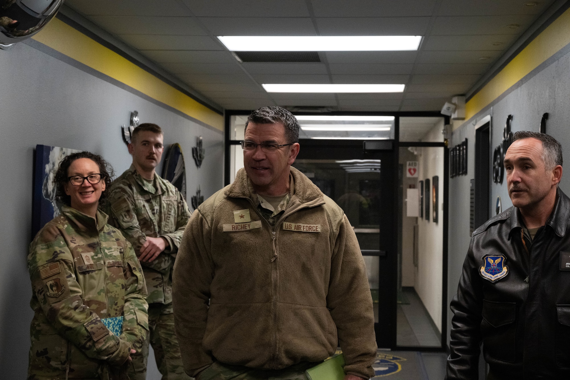 U.S. Air Force Col. Jesse Lamarand, 5th Bomb Wing commander, accompanies U.S. Air Force Brigadier Gen. Mark Richey, mobilization assistant to the commander, Eighth Air Force, and Joint-Global Strike Operations Center, on a visit to Minot Air Force Base, North Dakota, Nov. 14, 2024. Richey’s visit to Minot AFB allowed the base to display its functions and operations. (U.S. Air Force photo by Airman 1st Class Wesley Davies)