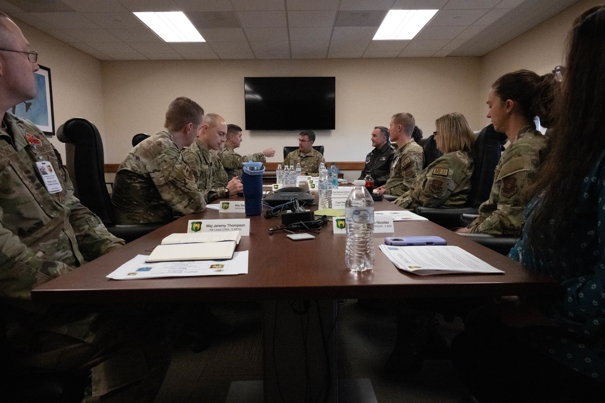 U.S. Air Force Brigadier Gen. Mark Richey, mobilization assistant to the commander, Eighth Air Force, and Joint-Global Strike Operations Center, receives a briefing about the 5th Medical Group operations at Minot Air Force Base, North Dakota, Nov. 14, 2024. The Eighth Air Force and Joint-Global Strike Operations Center conducts indefinite strategic deterrence operations in order to protect the United States of America. (U.S. Air Force photo by Airman 1st Class Wesley Davies)