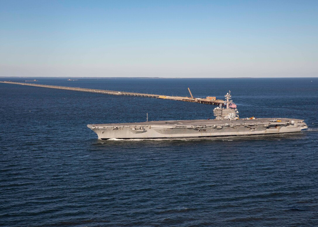 The Nimitz-class aircraft carrier USS George H.W. Bush (CVN 77), transits to Naval Station Norfolk after on-time completion of an 11-month maintenance period at Norfolk Naval Shipyard and sea trials, Nov. 16, 2024.