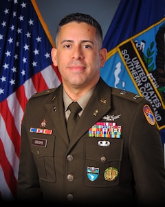 Official bio photo of CWO5 Cándido M. Crespo.