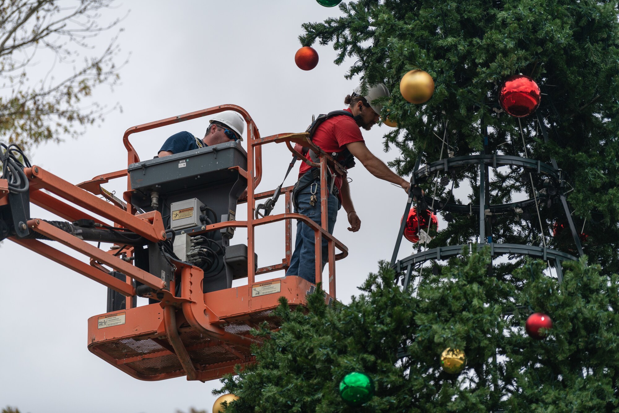 Craft personnel at Arnold Air Force Base, Tenn., work Nov. 5, 2024, to construct the large Christmas tree located just inside the Arnold AFB Main Gate. A lighting ceremony for the tree will take place at Arnold on Dec. 3 at 4 p.m. (U.S. Air Force photo by Keith Thornburgh)