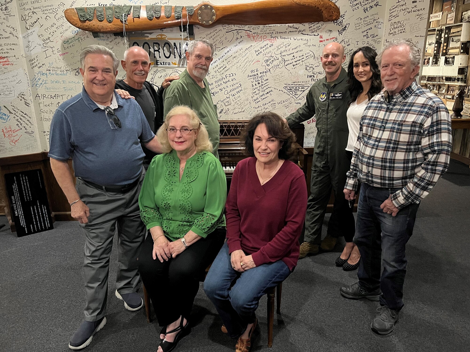 Gathered to dedicate the Erelene Hayes piano in Pancho’s Lounge are, left to right, James Jr., Ed, Terri, Keith and Heather Hayes, Col. James Hayes, and Teresa and Milton Vaught.