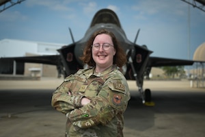 U.S. Air Force Senior Airman Toniann Peters, 33rd Operations Support Squadron intelligence analyst, assists F-35A Lightning II student pilots by providing information regarding aircraft and weapon systems used by adversaries.