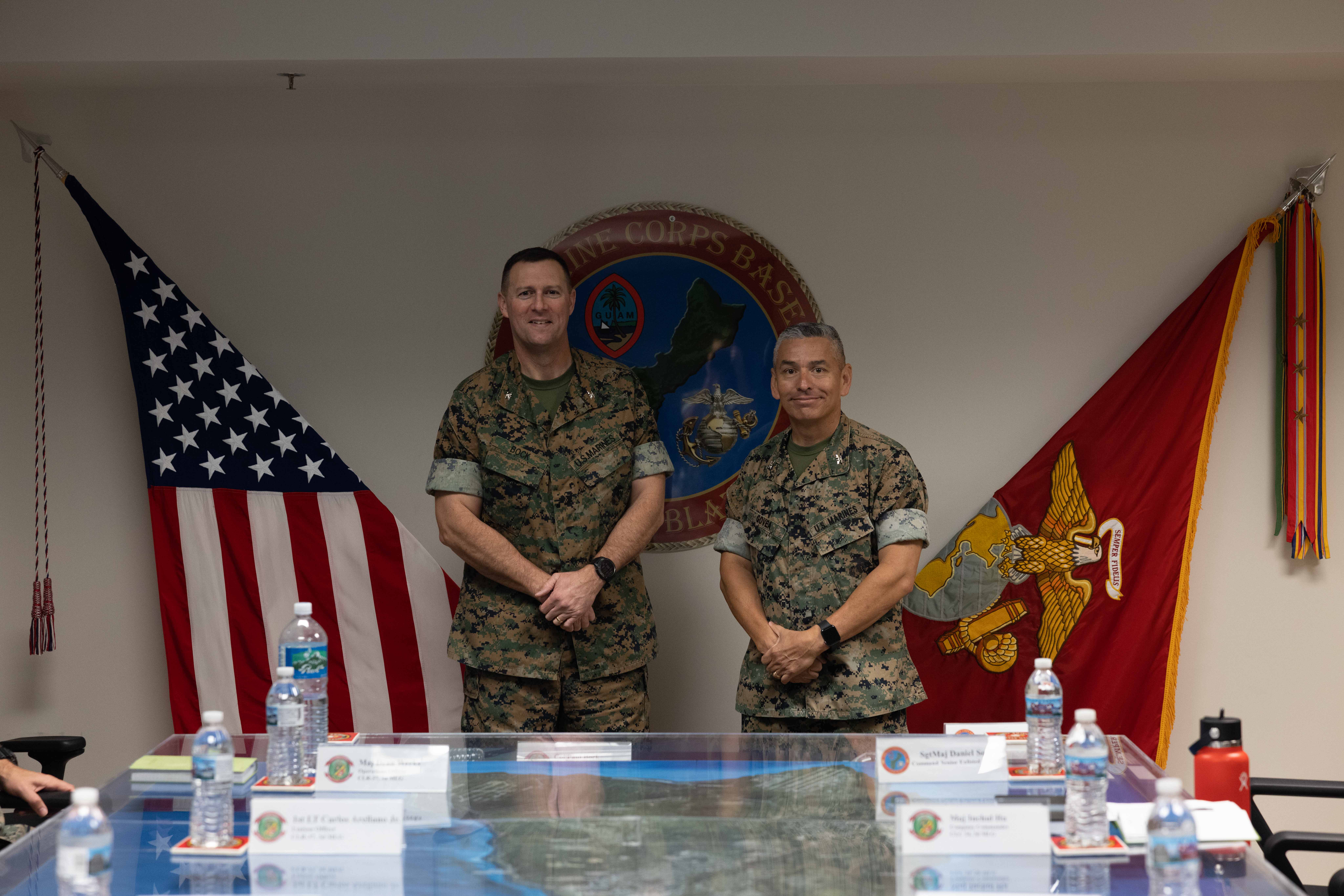 U.S. Marine Corps Col. Paul B. Bock, commanding officer, Combat Logistics Regiment 37, 3rd Marine Logistics Group, poses for a photo with U.S. Marine Corps Col. Ernest Govea, commanding officer, Marine Corps Base Camp Blaz, on MCB Camp Blaz, Guam, Nov. 18, 2024. Col. Bock visited MCB Camp Blaz to see the installation’s construction progress. (U.S. Marine Corps photo by Lance Cpl. Tanner Currin)