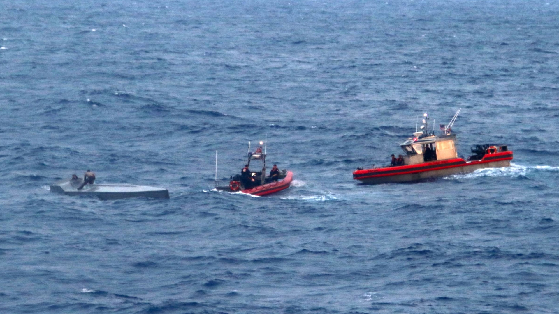 U.S. Coast Guard Cutter Munro (WMSL 755) crews interdict a vessel suspected of smuggling drugs in international waters of the Eastern Pacific Ocean, October 2024. Munro is the sixth Legend-class national security cutter and is homeported in Alameda, California. U.S. Coast Guard courtesy photo.