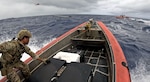 U.S. Coast Guard Cutter Munro (WMSL 755) crews interdict a vessel suspected of smuggling drugs in international waters of the Eastern Pacific Ocean, October 2024. Munro is the sixth Legend-class national security cutter and is homeported in Alameda, California. U.S. Coast Guard courtesy photo.