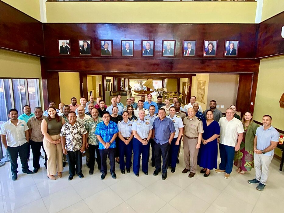 U.S. Coast Guard representatives, including Capt. Worst, Lt. Cmdr. Derek Wallin, maritime advisor, and Lt. Anna Maria Vaccaro, Compact of Free Association liaison, from U.S. Coast Guard Forces Micronesia/Sector Guam (FM/SG) join U.S. and Marshallese colleagues for a photo in Majuro, Republic of the Marshall Islands on Oct. 17, 2024.
