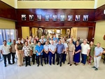 U.S. Coast Guard representatives, including Capt. Worst, Lt. Cmdr. Derek Wallin, maritime advisor, and Lt. Anna Maria Vaccaro, Compact of Free Association liaison, from U.S. Coast Guard Forces Micronesia/Sector Guam (FM/SG) join U.S. and Marshallese colleagues for a photo in Majuro, Republic of the Marshall Islands on Oct. 17, 2024. U.S. Coast Guard personnel joined the Republic of the Marshall Islands (RMI) and other U.S. leaders for the Joint Committee Meeting in Majuro from Oct. 13 to 17, 2024, to strengthen bilateral maritime partnerships and chart future initiatives supporting RMI’s maritime security and resilience. (Courtesy U.S. IndoPacific Command)