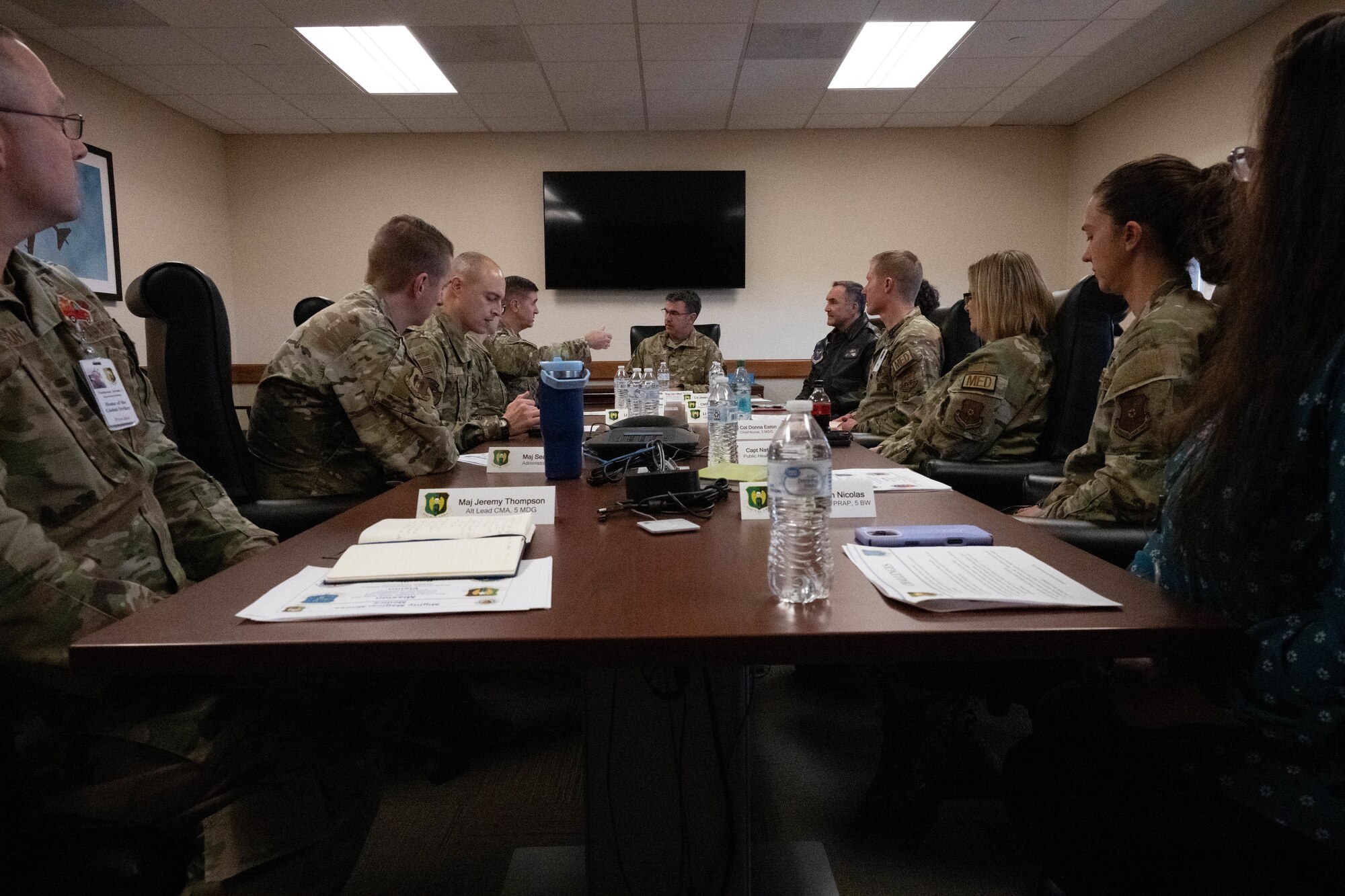 U.S. Air Force Brigadier Gen. Mark Richey, mobilization assistant to the commander, Eighth Air Force, and Joint-Global Strike Operations Center, receives a briefing about the 5th Medical Group operations at Minot Air Force Base, North Dakota, Nov. 14, 2024. The Eighth Air Force and Joint-Global Strike Operations Center conducts indefinite strategic deterrence operations in order to protect the United States of America. (U.S. Air Force photo by Airman 1st Class Wesley Davies)