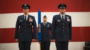 Photo  of Col. Patrick Wnetrzak, 492d Special Operations Wing commander, and Lt. Col. Jesse Ziegler, 17th Special Operations Squadron commander, at a ceremony.