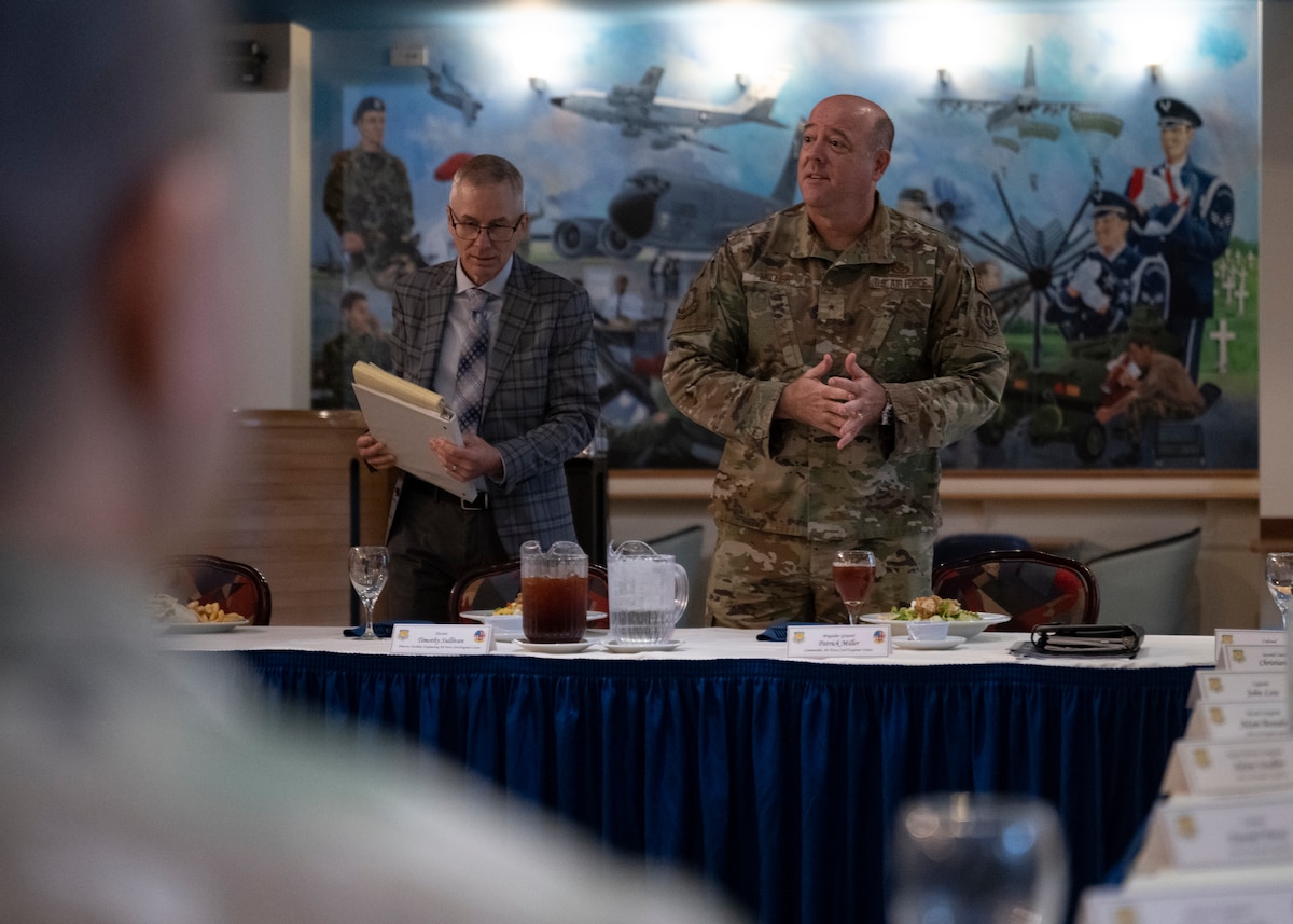 U.S. Air Force Brig. Gen. Patrick Miller, Air Force Civil Engineer Center commander, Joint Base San Antonio-Lackland, Texas, talks with service members at Royal Air Force Mildenhall, England, Nov. 14, 2024. Miller attended meetings about RAF Mildenhall’s current infrastructure needs and requirements. (U.S. Air Force photo by Senior Airman Nash Truitt)