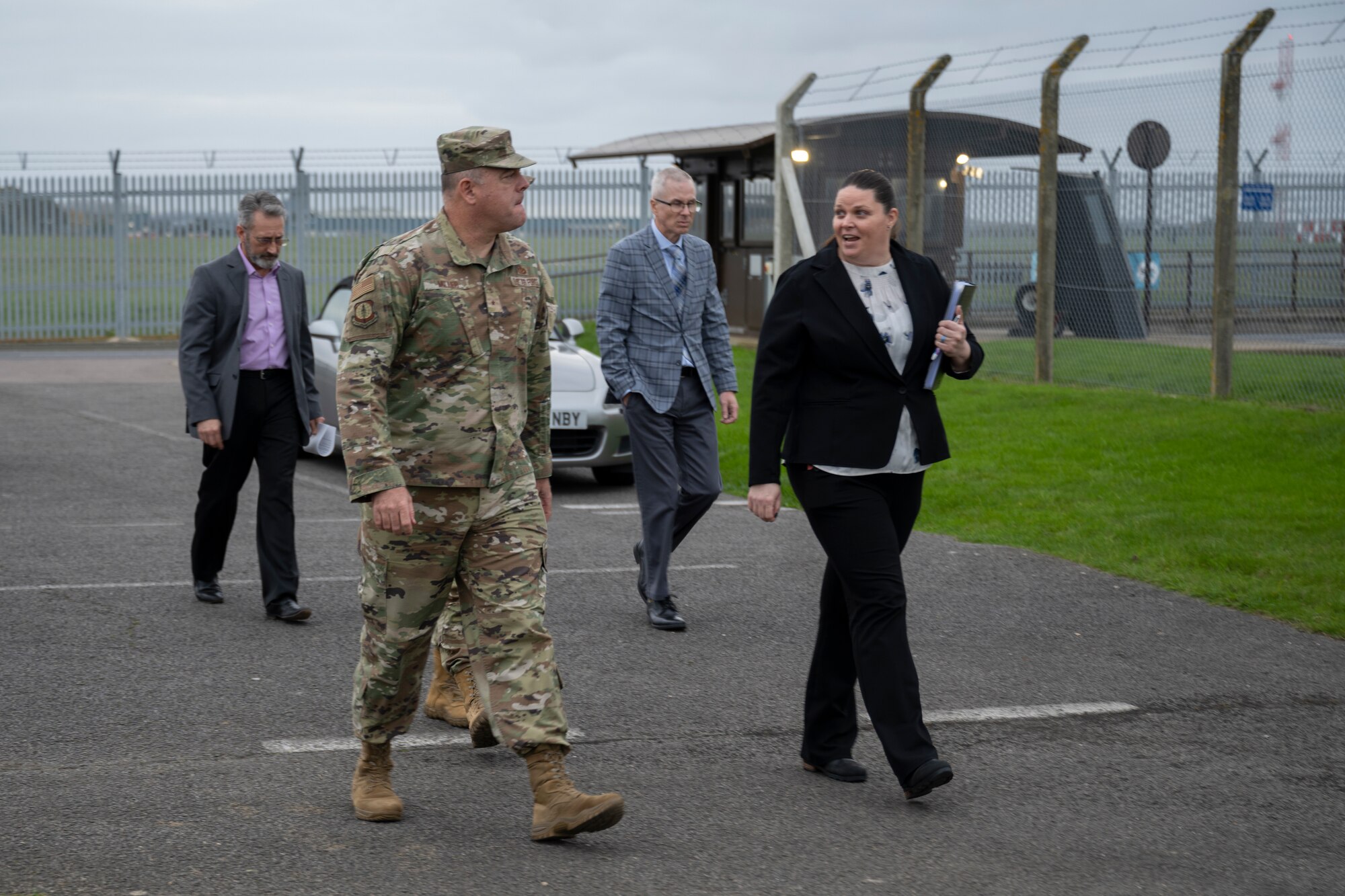 U.S. Air Force Brig. Gen. Patrick Miller, Air Force Civil Engineer Center commander, Joint Base San Antonio-Lackland, Texas, talks with service members at Royal Air Force Mildenhall, England, Nov. 14, 2024. Miller attended meetings about RAF Mildenhall’s current infrastructure needs and requirements. (U.S. Air Force photo by Senior Airman Nash Truitt)