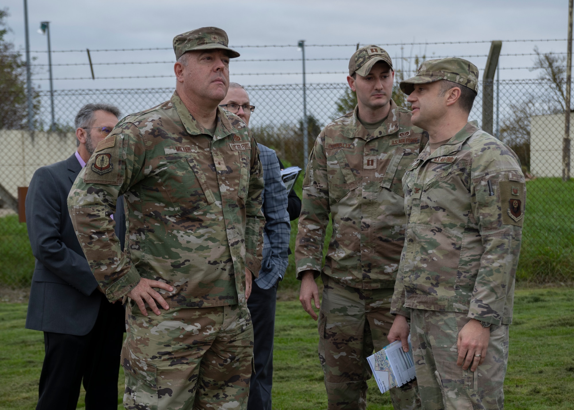 U.S. Air Force Brig. Gen. Patrick Miller, Air Force Civil Engineer Center commander, Joint Base San Antonio-Lackland, Texas, talks with service members at Royal Air Force Mildenhall, England, Nov. 14, 2024. Miller attended meetings about RAF Mildenhall’s current infrastructure needs and requirements. (U.S. Air Force photo by Senior Airman Nash Truitt)
